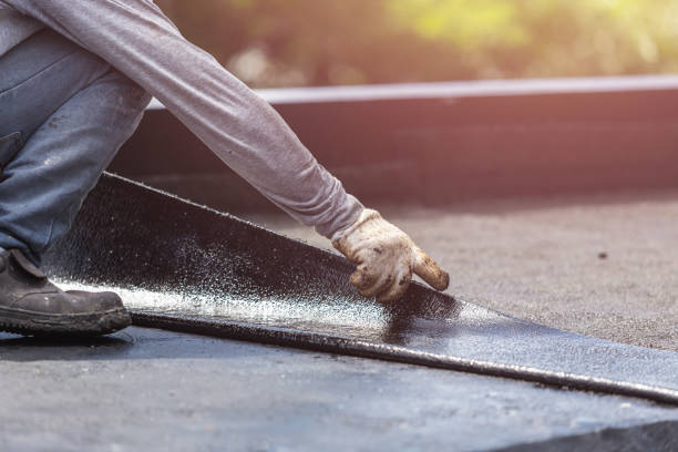 Professional Emergency Waterproofing technician working in Farmington, MI